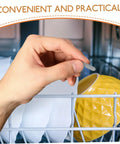 Hand inserting a dishwasher rack end cap in a dishwasher, highlighting the Huge Pack Of Dishwasher Rack End Caps And Tine Protectors Featuring A Hell Of An Easy Snap Installation For Modern Kitchens Solid Heavy Duty Replacement Parts That Really Fix Peeling Or Snapped Pegs In A Jiffy.
