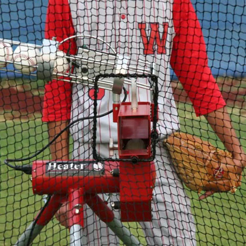 Close-up of baseball pitching machine and batsman within Xtender 36 Ft Batting Cage With Fiberglass Arch Frame And Polyester Netting Portable