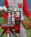 Xtender 48Ft Home Batting Cage With Foam Padding, Heavy Duty Nylon Netting, Built In Pitching Machine Harness on field
