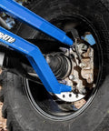 Heavy-Duty High Clearance Boxed Rear Radius Arms For Polaris RZR Models In Voodoo Blue Or Velocity Blue Finish, 4x Stronger Than Stock, Includes Hardware, Easy Install, Will Not Fit With Polaris Rear Bumpers, Fits 2014+ XP And XP 4 1000, RS1 blue rear suspension arm on tire
