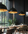 Black Dome Pendant Light With Dope Gold Leaf Interior, 20 Inch Industrial Chandelier in modern dining room setting