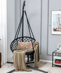 Macrame Hammock Chair Swing With Cushioned Seat And Hardware Kit For Indoor Outdoor Chill, Supports Up To 330 Lbs in a living room