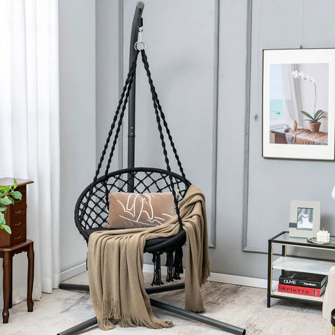 Macrame Hammock Chair Swing With Cushioned Seat And Hardware Kit For Indoor Outdoor Chill, Supports Up To 330 Lbs in a living room