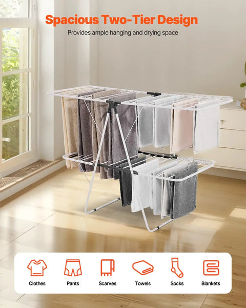 Heavy Duty Two Tier Clothes Drying Rack With 31 Sturdy Rods And Sock Clips Foldable Metal Laundry Stand Adjustable Height For Indoors Or Yard No Sweat Dry Setup with clothes and towels drying.