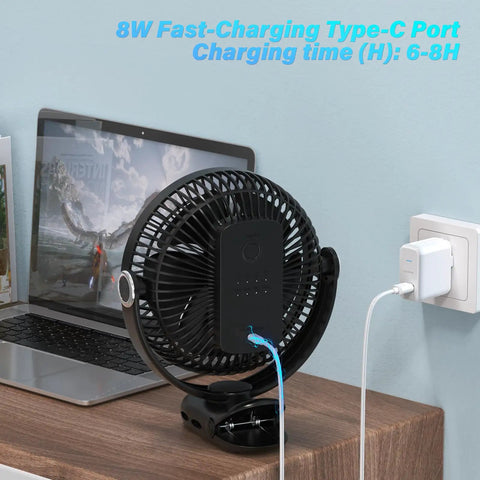 Power-Packed 12000mAh Clip-On Fan with 8 Inch Blade charging on desk by USB, next to laptop, 4-in-1 versatile design