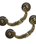 Six Pack Vintage Drop Bail Cabinet Handles In Antique Brass Finish, 3-1/2 Inch Hole Centers close-up view