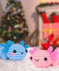 Blue and pink crochet axolotls from All In One Beginner Crochet Kit With Axolotl Pattern And Video Tutorials For Adults And Teens Starter