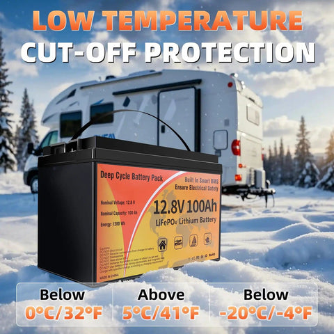 12V 100Ah LiFePO4 Battery With Smart 100A BMS in snowy landscape, RV in background showcasing cold weather use