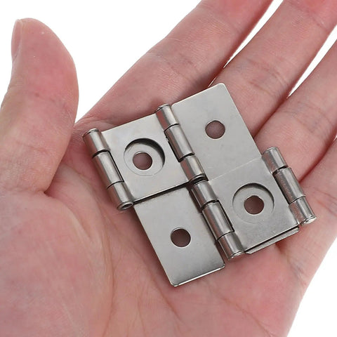 Vintage Iron Square Hinges Set For Furniture And Cabinets, shown in hand, highlighting size and material, stable flat design.