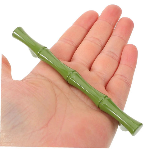 Green Zinc Alloy Cabinet Pulls Set 2 Pack, Sleek Cupboard Handles For Dresser, showcased in hand, durable modern accessory.