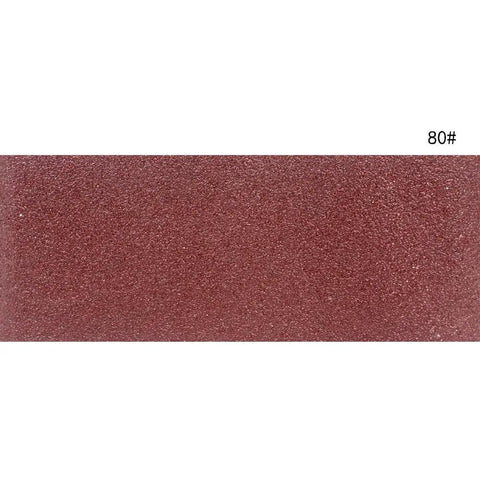 Close-up of 80 grit Rugged 3X21 Inch Sanding Belts, 12 Pack Aluminum Oxide Open Coat For Belt Sander.