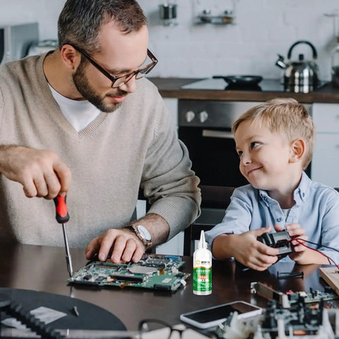 Father and son using Pro Grade Aluminum Soldering Flux Liquid for Quick Dry Welds, colorless stainless steel flux paste on electronics.
