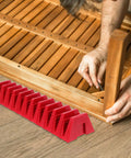 12 Piece Modular Wrench Storage Rack Magnetic Tool Holder Organizer Tray for toolbox and garage, red plastic, on floor.