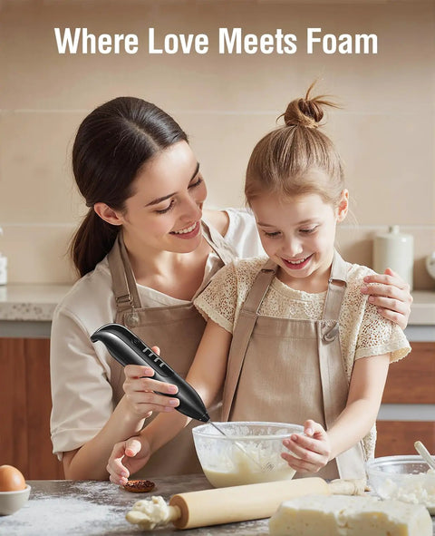 Woman and child using Rechargeable Electric Milk Frother Handheld 3 In 1 With LED Display And Wireless Charging in kitchen