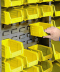 Heavy Duty Steel Garage Cabinet With Three Adjustable Shelves And 72 Bright Yellow Parts Bins showing adjustable yellow bins being organized.