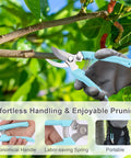 Two Pack Pruning Shears With Stainless Steel Blades being used on a branch, showing ergonomic grip and spring-loaded mechanism.