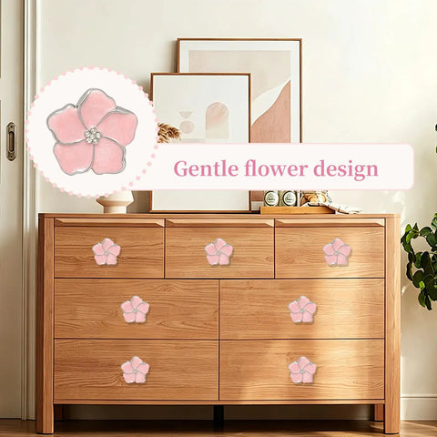 Top Shelf Pink Floral Cabinet Knobs And Drawer Pulls Set Of Four Damn Cute Petal Handles on a wooden dresser.