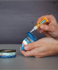 Applying Clear All Purpose Glue In Four 3 Gram Tubes With Fast Setting For Projects And Repairs Bonds Glass Plastic Wood Metal Ceramic Rubber Leather Paper And More Featuring Crystal Clear Formula And High Impact Tough Bond For Quick Seamless Fixes to a ceramic object