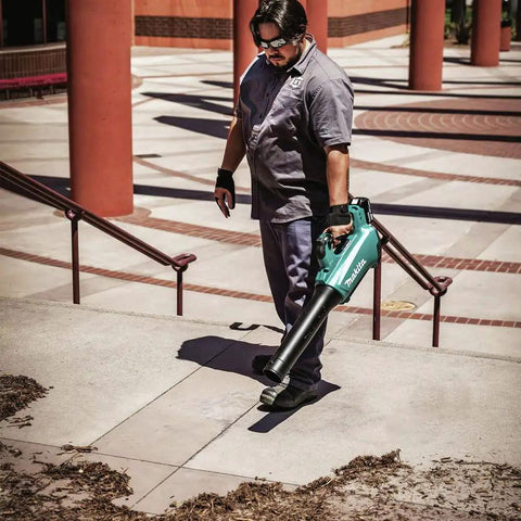 Renewed Brushless Cordless Leaf Blower Handles Your Yard Work Like A Champ With A Solid 459 Cfm And 116 Mph Blast, man using on steps.