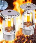 Premium Concealed Fire Sprinkler Head Pendent Mount 57 Degree Activation on background of flames, chrome finish with glass bulb.