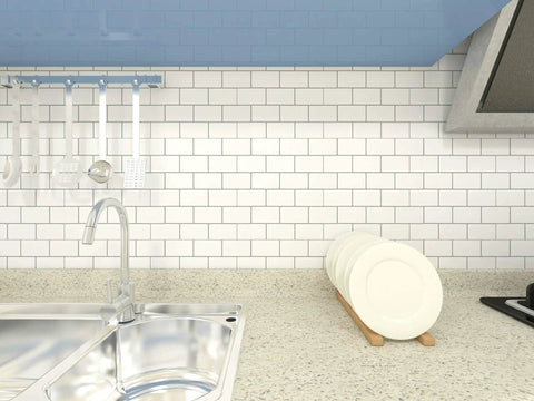 Peel And Stick Backsplash Tile Kit 12x12 Off White Subway Tiles With Grey Grout 10 Sheets Easy DIY No Mess Eco Friendly Kitchen Upgrade Self Adhesive Tiles With Shiny Finish For Quick Remodel installed in kitchen setup, glossy white tiles with grey grout near sink and dish rack.