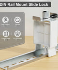 Manual Locking Breaker Device for DIN Rail Mounts, showcasing slide lock mechanism and design for industrial and home use.
