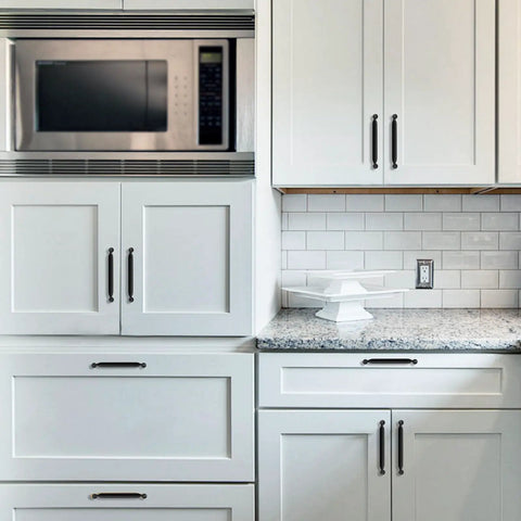 Heavy Duty Zinc Alloy Kitchen Cabinet Pulls, 5 Inch Sleek Matte Black Drawer Handles on white kitchen cabinets.