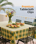 12 Pack Heavy Duty Tablecloth Clips, Stainless Steel Rust Proof Tablecloth Clamps securing a tablecloth on patio table