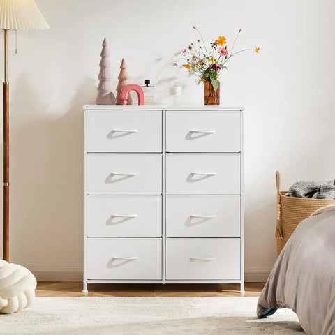 Versatile Fabric Dresser With 8 Bin Chest Organizer And Fabric Storage Tower in bedroom setting, wooden top with decor items
