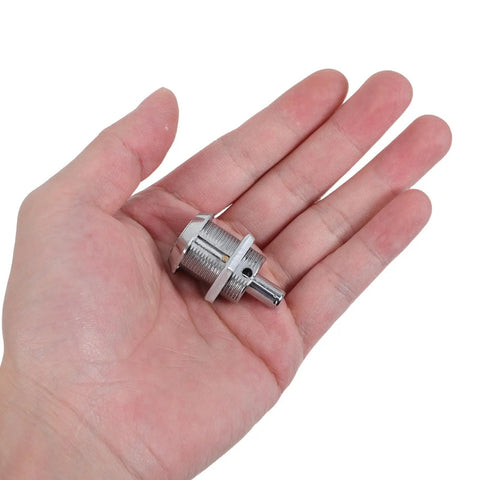 Secure Your Setup With This Sick Black Metal Vending Machine Lock Assembly With Tubular Keys For Snack Candy Dispensers Ensuring Quick Fixes And No Sweat Maintenance To Keep Your Stock Safe And Business Rolling Smoothly Right Now. black metal tubular lock assembly in hand, compact steel snack vending machine lock