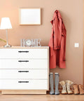 White dresser with Matte Black Cabinet Pulls 30 Pack Stainless Steel 3 Inch Center To Center Drawer Handles, lamp, and coat in room.
