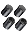 Premium Metal Tire Valve Caps 4 Pack With Plastic Liner Built To Last Durable Corrosion Resistant And Leak Proof Universal Schrader Fit For Cars Trucks Motorcycles And Bikes Black; showing four black aluminum valve caps with plastic liners.