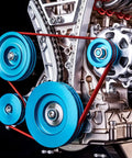 Metal 4-Cylinder Engine Model Kit For Adults And Teens, 325+ Precision Parts, DIY Mechanical Build With Realistic Movement, 4+ Hours Assembly, STEM Project For Car Junkies And Hobbyists, close-up of blue pulleys
