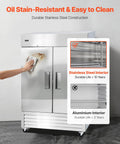 Heavy Duty Stainless Steel Upright Freezer 54 Inches Wide 44 Cubic Feet with a person cleaning its shiny surface.