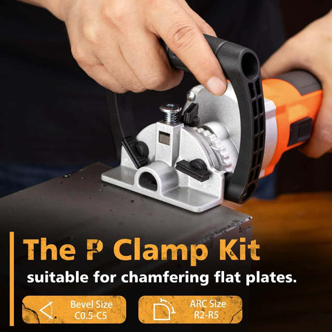 Handheld chamfer tool in orange and black being used to bevel a metal plate on a silver base with clamps.