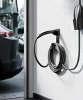 Keeping Your Tesla Setup Slick Demands A Solid Mount This Heavy Duty Stainless Steel Wall Charger Holder features a wall-mounted ev charger with coiled cable.