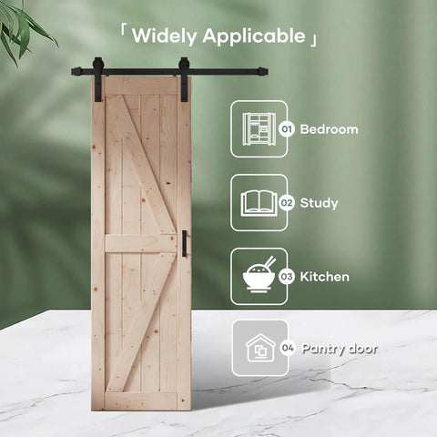 24 Inch By 84 Inch Sliding Barn Door With Hardware Kit Included Four Foot Solid Spruce Panel K Shape Wood Door For No Fuss DIY Assembly Rustic Farmhouse Style Interior Room Divider standing upright.