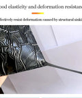 Close-up of Heavy Duty Aluminum Foil Bitumen Tape showing its elastic surface and deformation resistance for roof leak repair.