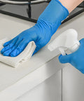 Person cleaning with Blue Nitrile Disposable Gloves Large Size No Latex No Powder Safe Working Gloves For Home And Work Chemical Resistant
