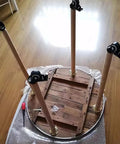 4 Pack Solid Beech Wood Furniture Legs With Wheels And Brakes installed on wooden base, tapered design for DIY furniture upgrade
