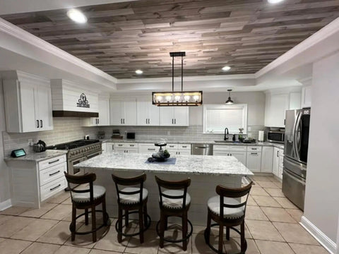 Straight Up Heavy Duty Reactive Water Based Interior Wood Stain Generates A Relaxed Coastal Driftwood Vibe Fully Voc Free Designed For Diy Craftsmen And Renovators Arrives Loaded Inside A Massive Fifty Five Gallon Tub in a modern kitchen with wood accents.