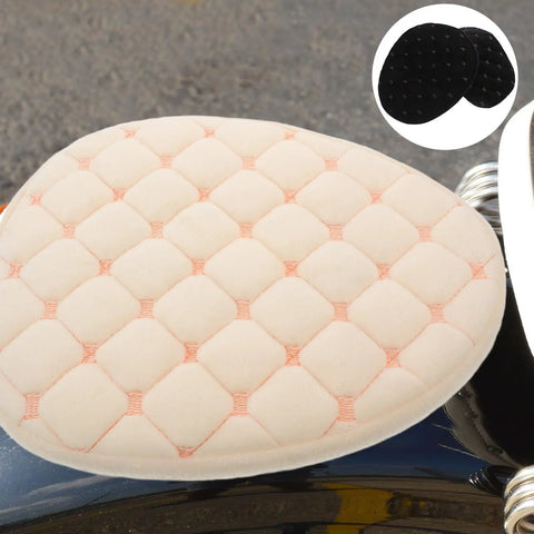 Hella Cozy Beige Plush Motorcycle Seat Cover With Super Warm Winter Fluffy Padding For Riders Seeking A Smooth Ride And Dope Dirt Bike Accessories That Look Clean And Feel Amazing All Day Long close-up view on motorcycle seat.