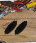 Two black enclosures from 20 Pack ABS Plastic Enclosure Boxes for Electronics Projects PCB Housing Black with Easy Install and Multi Wiring Configs Durable Storage Case for DIY Mods and a Pro Look on wooden workbench with tools.