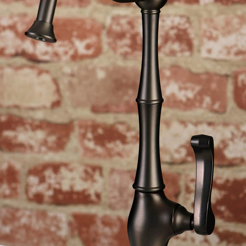 Close-up of Royale Cold Water Filtration Faucet In Oil Rubbed Bronze With Solid Brass Construction against brick wall