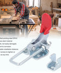 Heavy Duty Adjustable Toggle Latch Clamp For Cabinets Doors And Drawers 304 Stainless Steel in red and silver in a workshop.