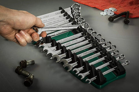 Hand using 16 Slot Reversible Wrench Rack Set For SAE And Metric Tools Up To 1 Inch, 2 Pack, Adjustable Design Delivers 30 Percent More Storage