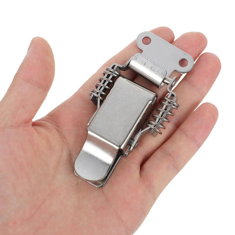 Hand holding Stainless Steel Spring Hasp Toggle Latch Lock With Dual Spring Design for Toolbox and Wooden Case