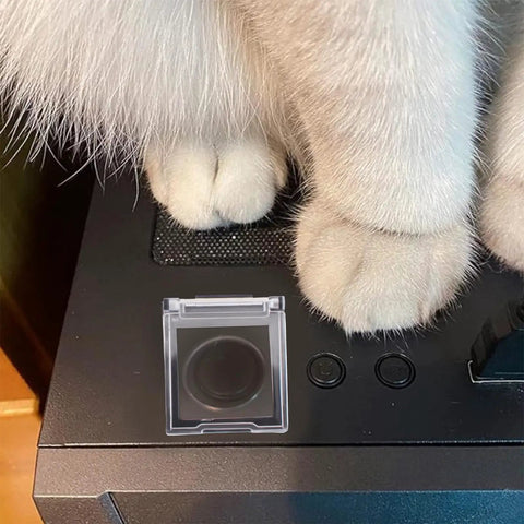 Cat paws near 2 Pack PC Power Button Covers, Dustproof Safety Push Button Guards for Computers, Child Proof Shield visible