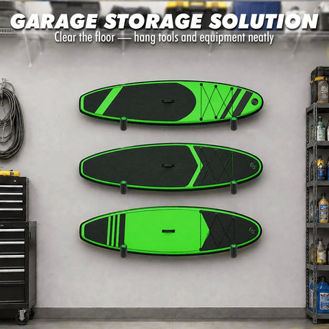 Tough As Nails Heavy Duty Kayak Storage Rack Double Pack Wall Mount Garage Hooks With Top Shelf Foam Wrapping Rock Solid Grip For Paddleboards Bikes Ladders All Weekend Gear holding green paddleboards on a garage wall.