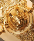 Slick Zinc Alloy Wall Sconces Featuring Elegant Crystal Accents For Smooth Cozy Bedroom And Living Room Lighting, close-up of decorative gold socket.